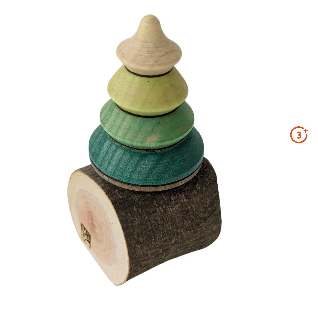 Mader Tree Spinning Top On Log