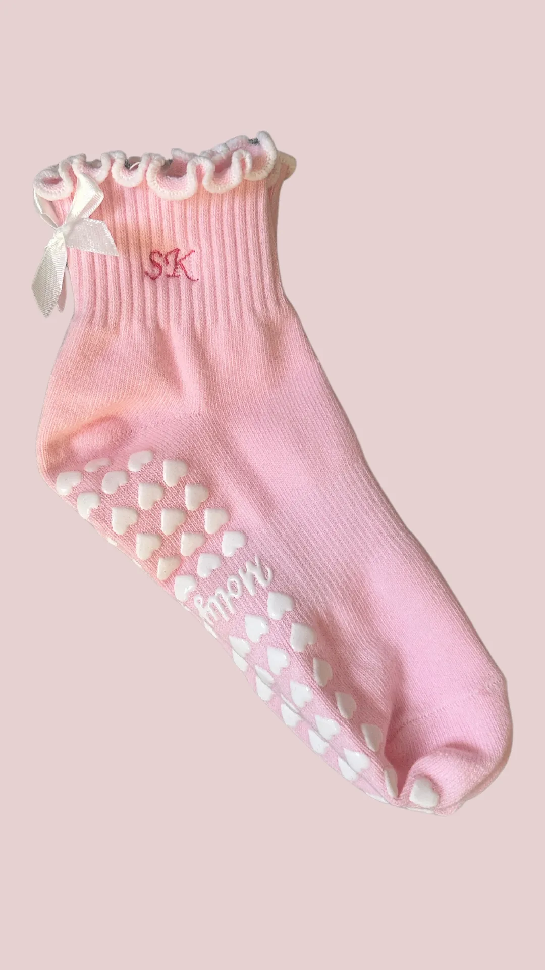 Pink & white custom initial grip sock with white bow