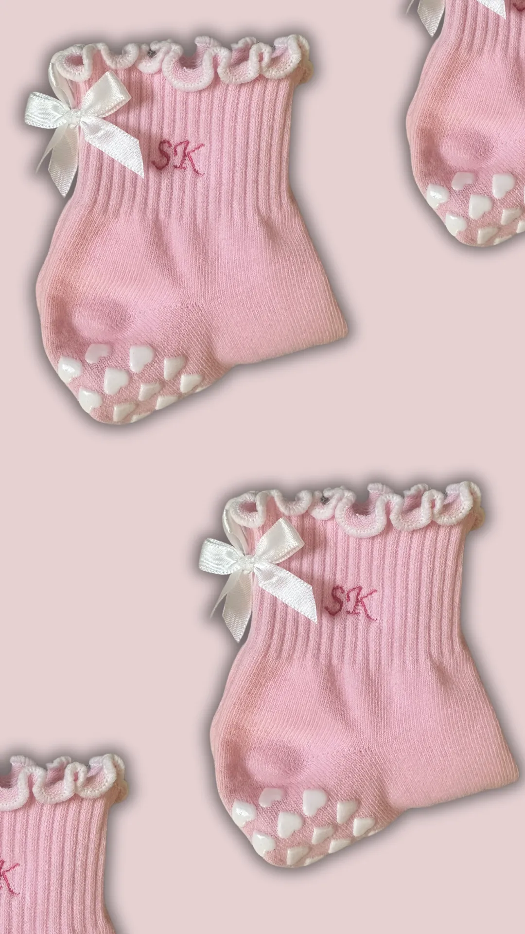 Pink & white custom initial grip sock with white bow