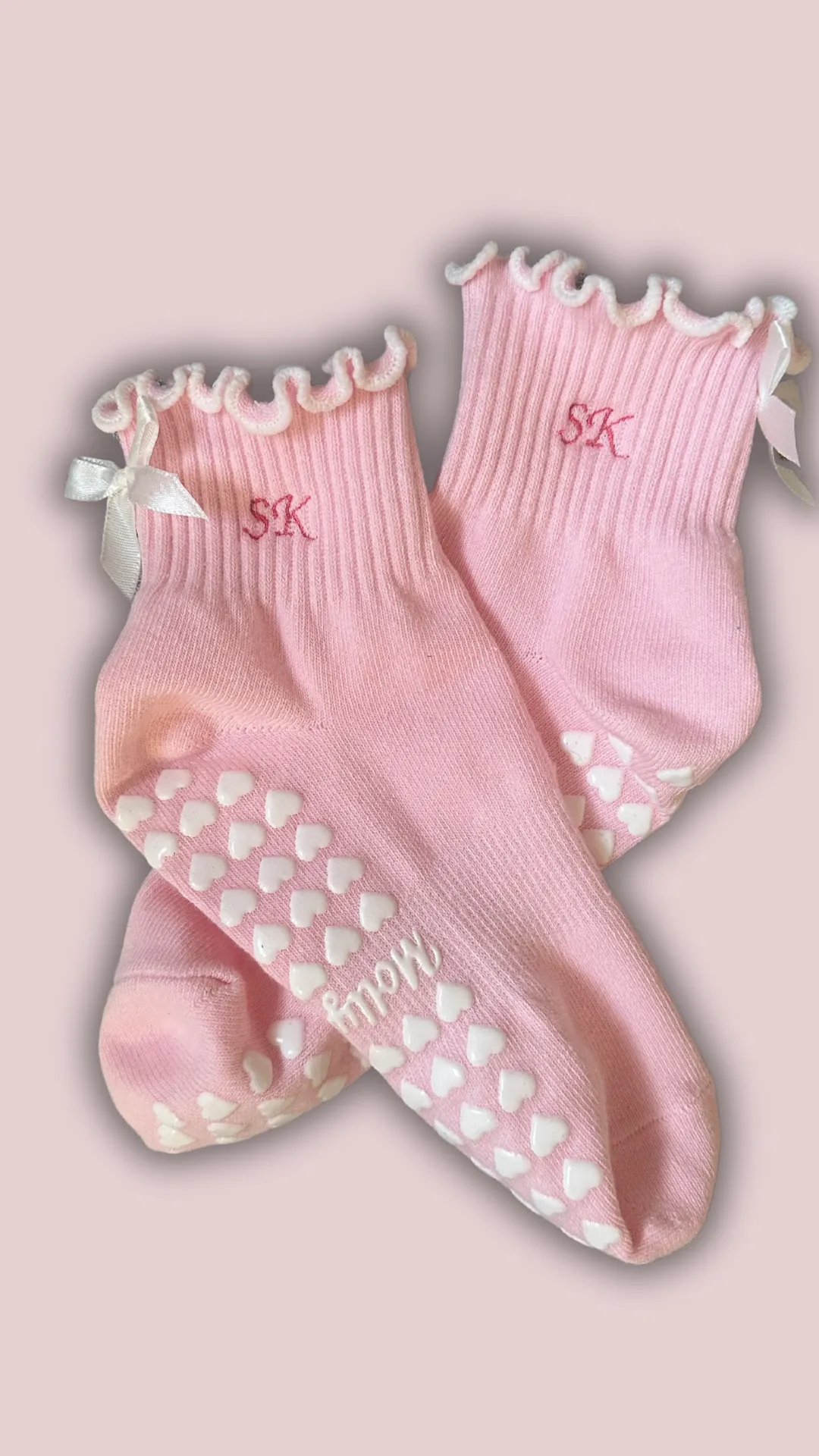 Pink & white custom initial grip sock with white bow